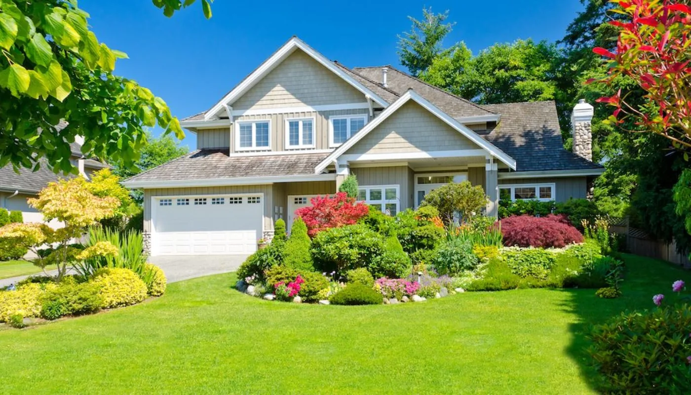 Large home with maintained landscaping